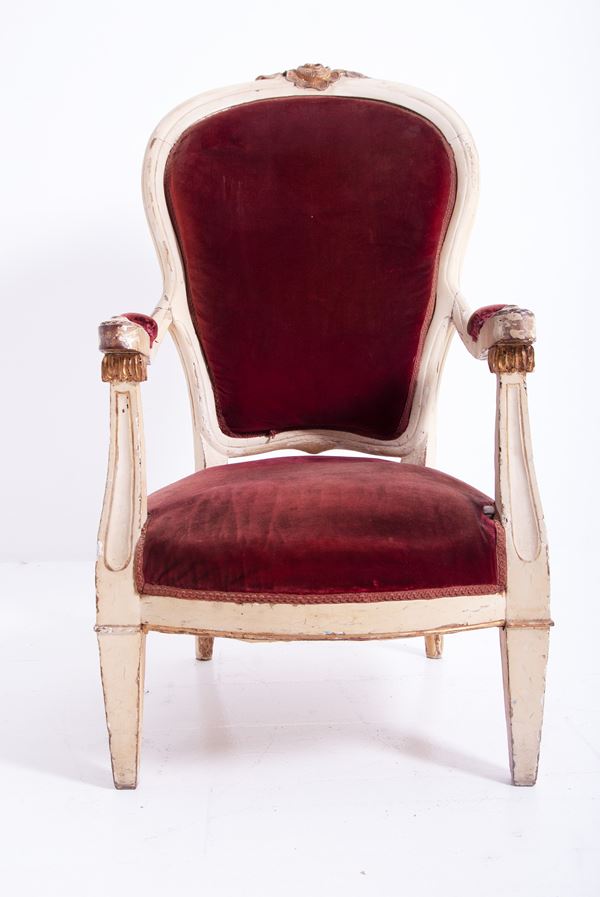 Armchair in lacquered wood