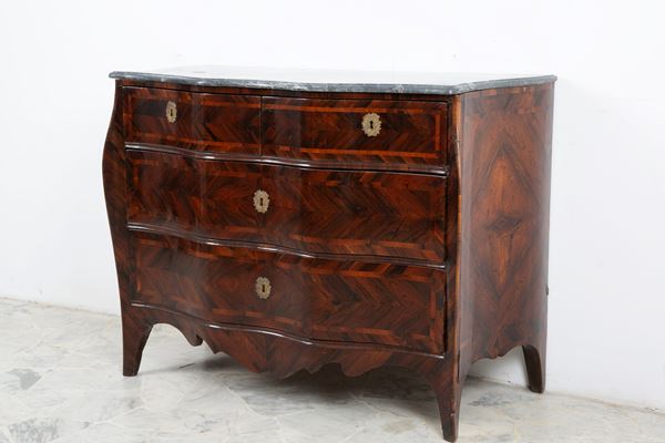 Chest of drawers with curved front and sides