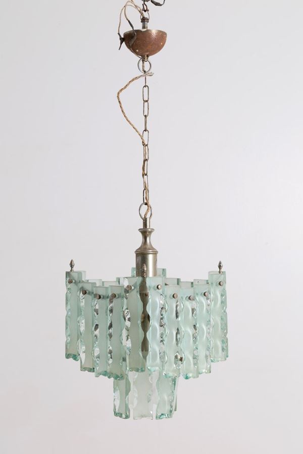 Lampadario a sette luci in vetro e metallo. Produzione ZEROQUATTRO. Anni '60. D...