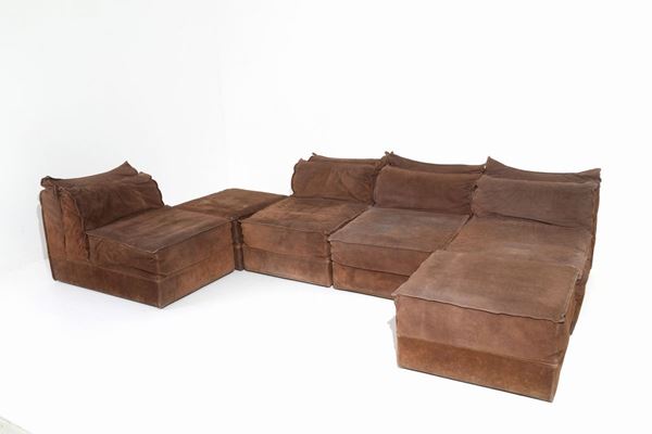 Four modular armchairs and two poufs for ABA