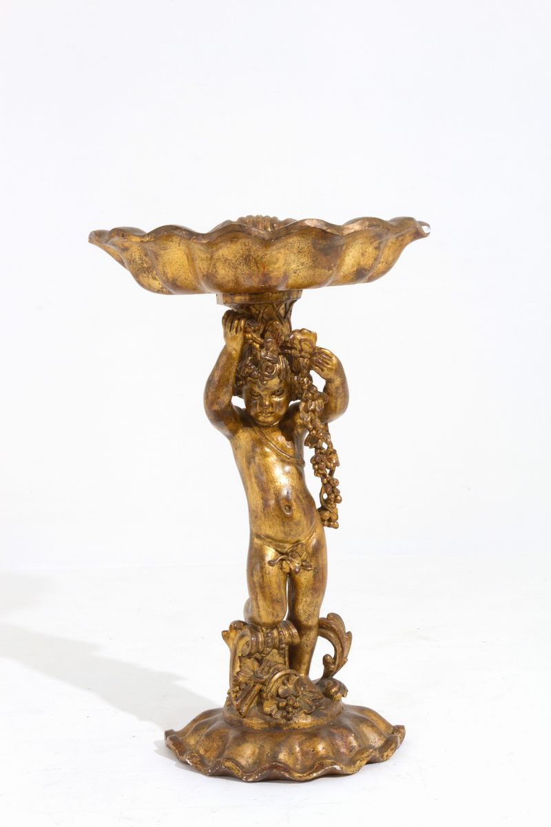 Scultura in legno intagliato e dorato raff. ''PUTTO CON CONCHIGLIA''. XIX  secol - Asta MILANO DECOR - Asta di Antiquariato, Vini e Distillati -  Viscontea Casa d'Aste