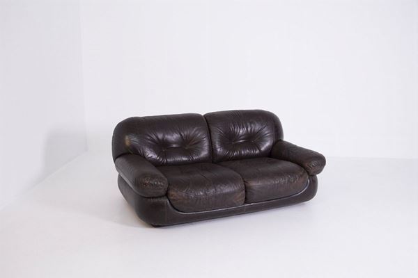 Two seater sofa in brown leather