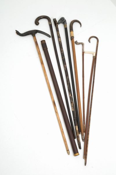 Nove Bastoni da Passeggio in Materiali Vari di Cui uno Animato con Ombrello. XI...