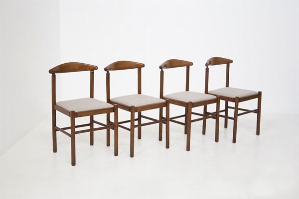 Quattro sedie in legno e tessuto grigio