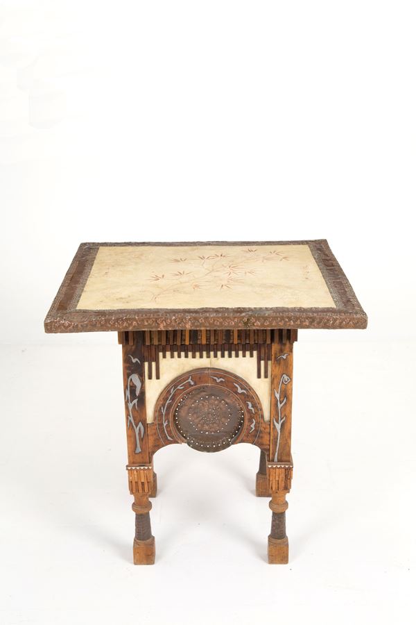 CARLO BUGATTI - Coffee table with parchment covering. Export ban