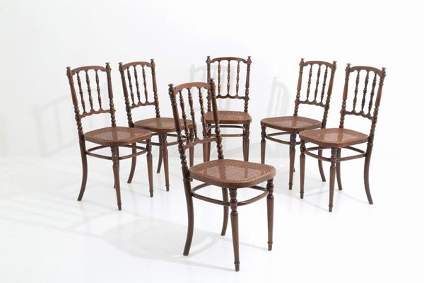 Six chairs in walnut and straw