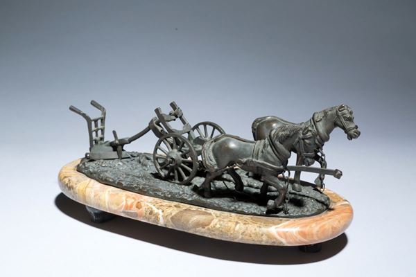Scultura in bronzo raff. ''DUE CAVALLI CHE TRAINANO UN ARATRO''. Base in marmo....
