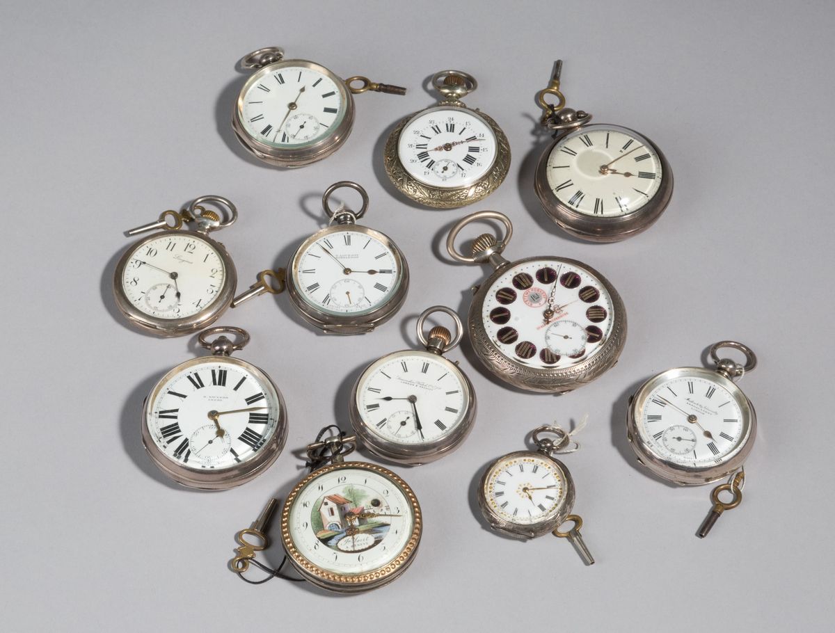 Undici orologi da tasca in argento. XIX secolo. Misure varie. ...