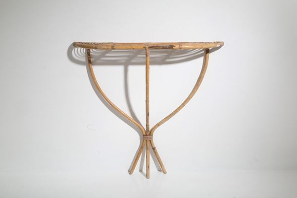 Consolle in rattan. Manifattura italiana. Anni '50....
