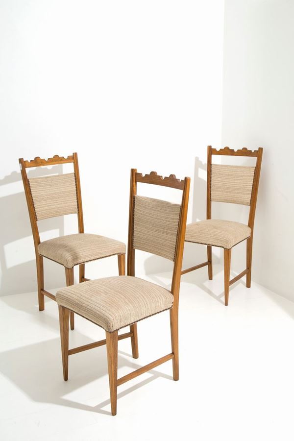 Tre sedie in legno e tessuto....
