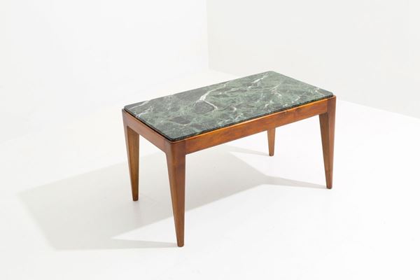 GIO PONTI - GIO PONTI (Milano, 1891-1979). Tavolino con struttura in legno e piano in marmo...