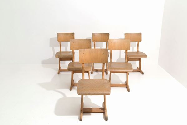 Six school chairs
