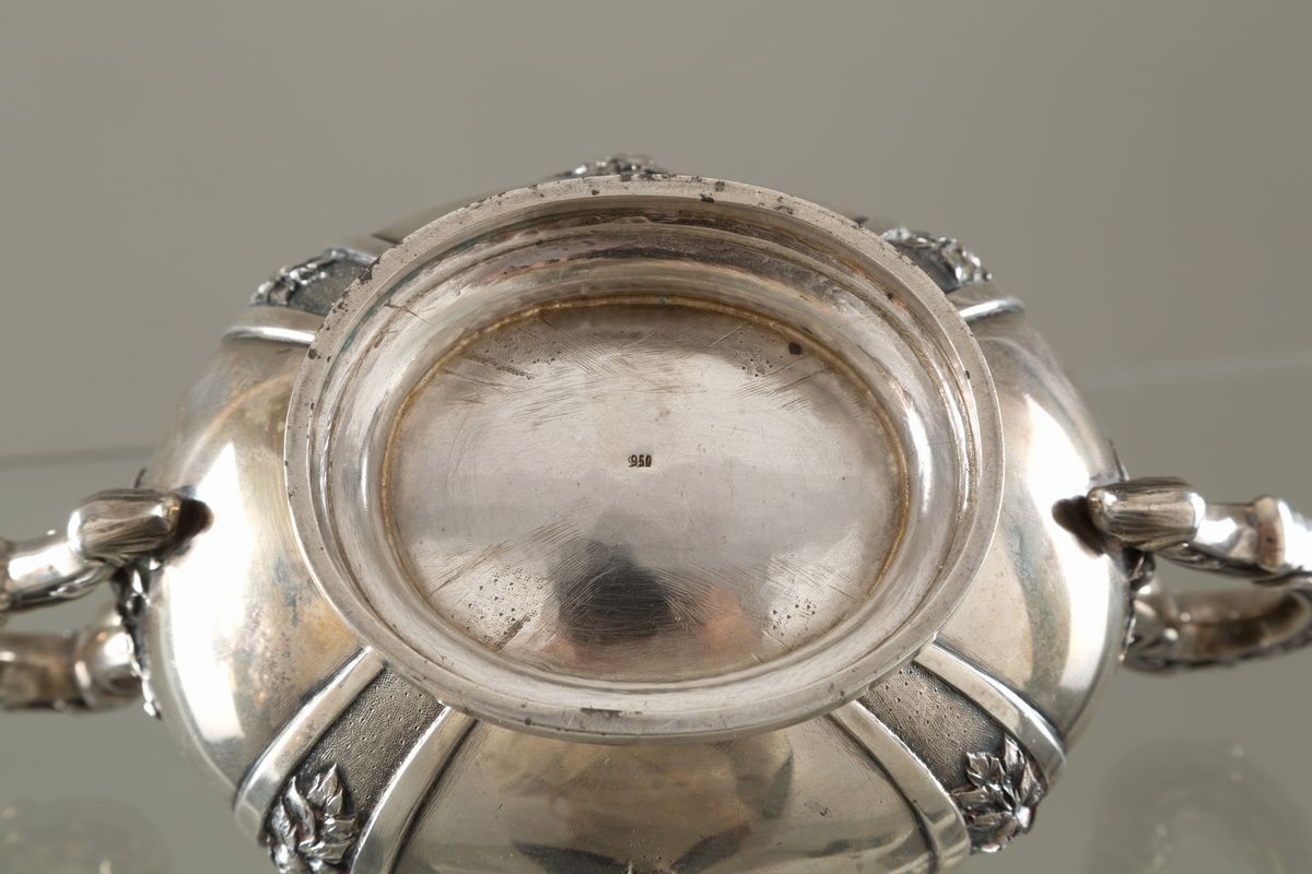 Teiera, zuccheriera e lattiera in argento 800, gr. 1700 ca. complessivi. XX sec...