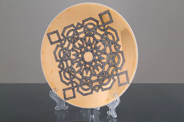 Ceramic plate `` INTARSIO ''. FORNASETTI production