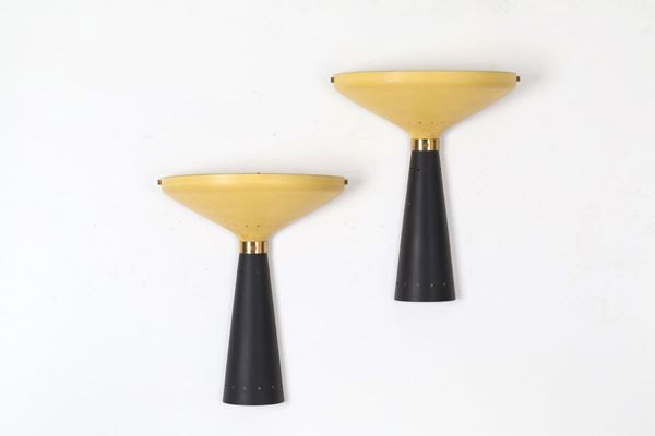 Coppia di applique in ottone e metallo verniciato giallo e nero. Produzione STI...