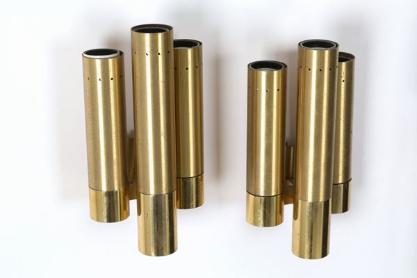 Two three-tube brass wall lights