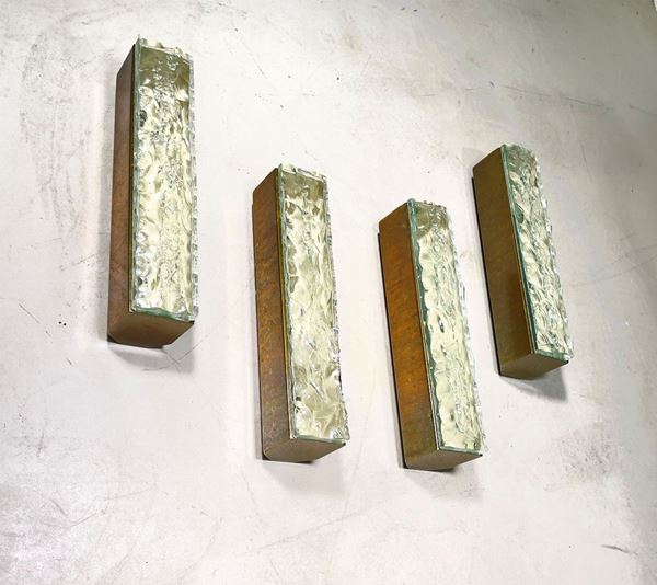Quattro applique. Produzione FONTANA ARTE