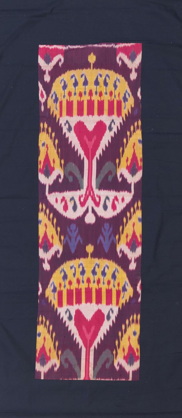 Fragment of silk Ikat fabric. Central Asia