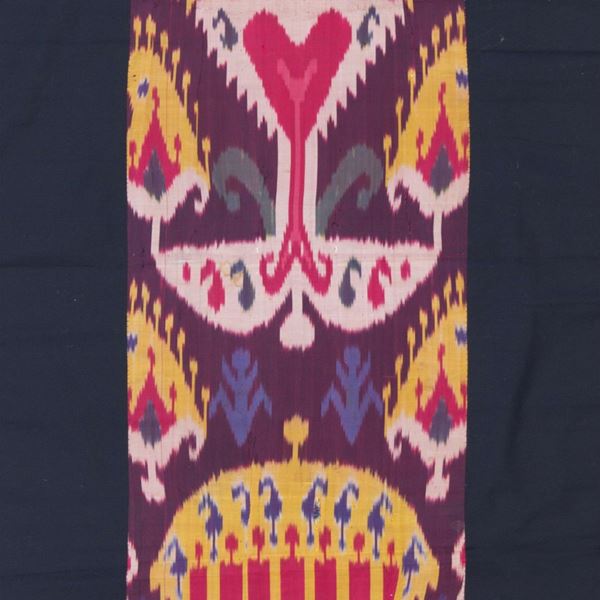 Fragment of silk Ikat fabric. Central Asia