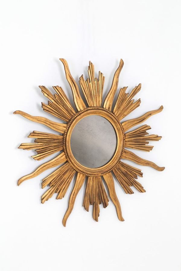 Sunburst mirror in gilded wood