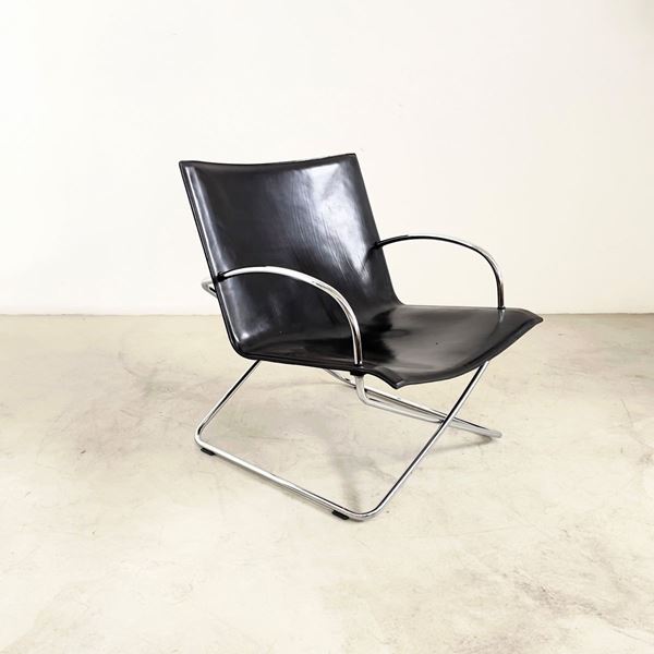 Armchair in steel and leather