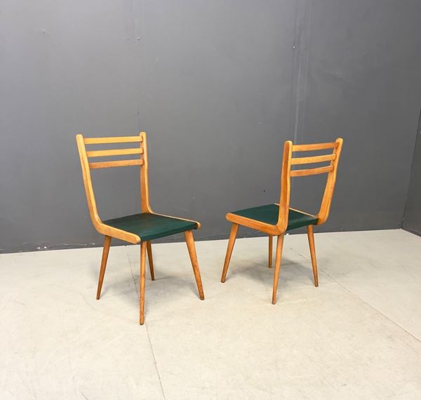 Two chairs in beech wood and sky. REGUITTI production