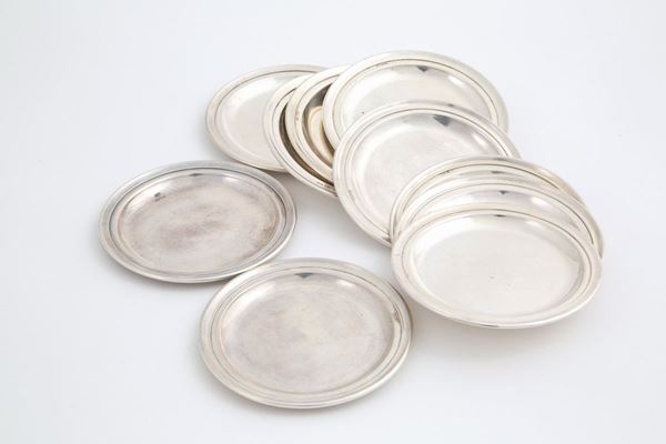 Ten 800 silver coasters