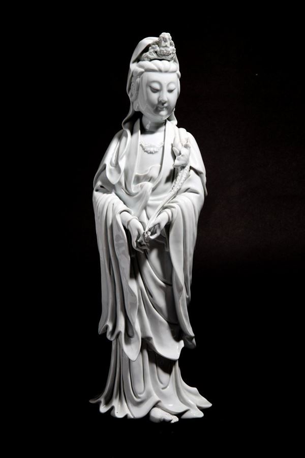 Guanyin with flower