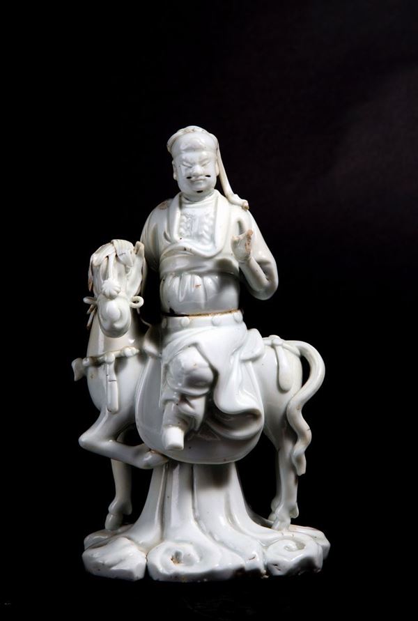 Oriental on horse in porcelain