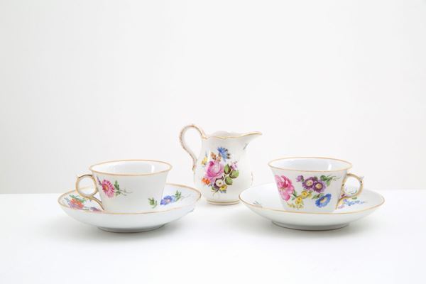 Two cups with saucer and milk jug. MEISSEN