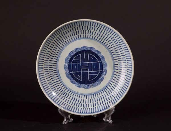 Piatto bianco e blu