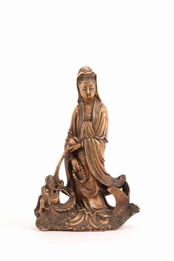 Soapstone sculpture "GUANYN ON A FANTASTIC ANIMAL"