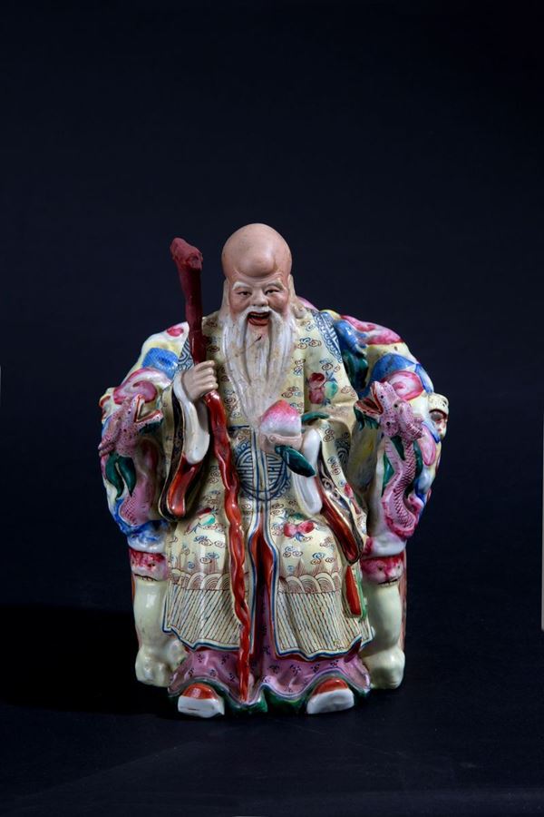 Porcelain sculpture "HOLY MAN ON THE THRONE"