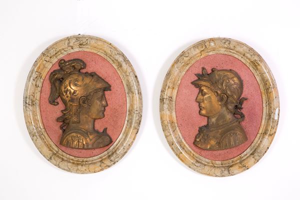 Pair of gilt bronze oval medallions
