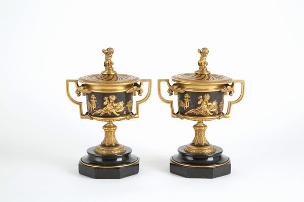 Two bronze cups