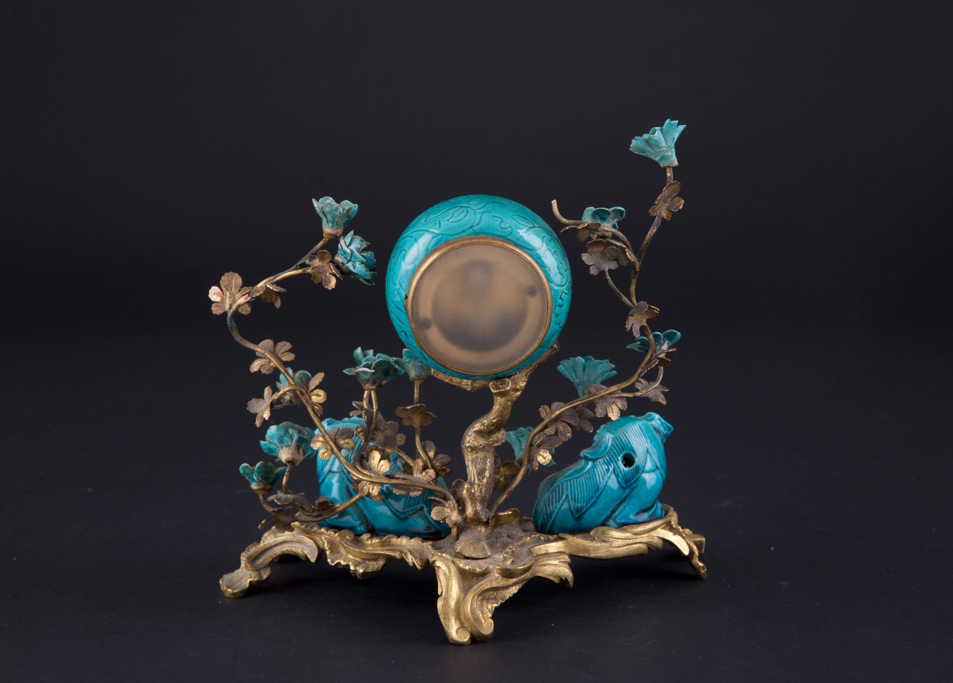 Orologio in bronzo e porcellana