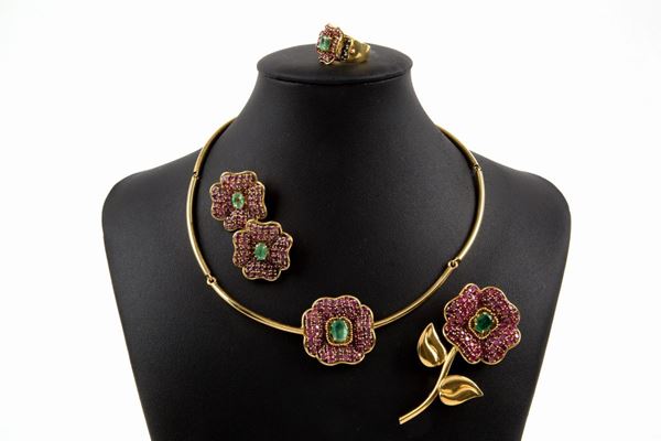 Yellow gold set with rubies and emeralds