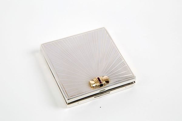 Silver compact with three rubies