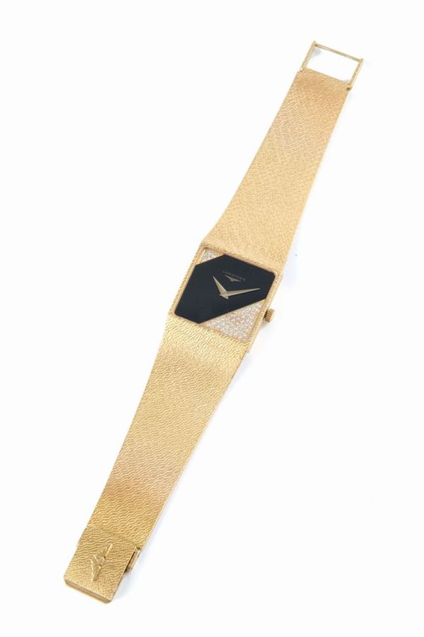 LONGINES. Gold watch