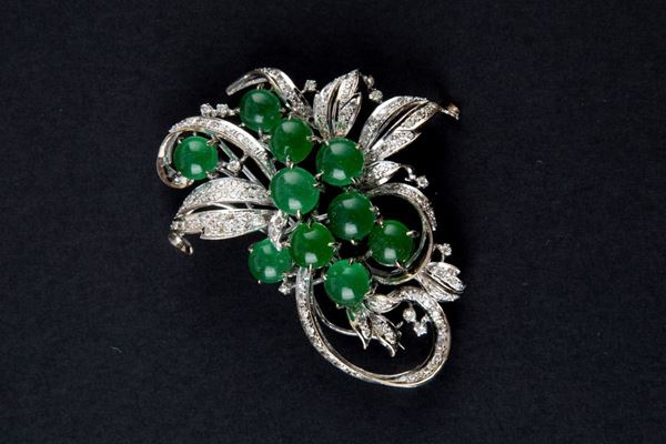 Spilla in oro con pietre e diamanti