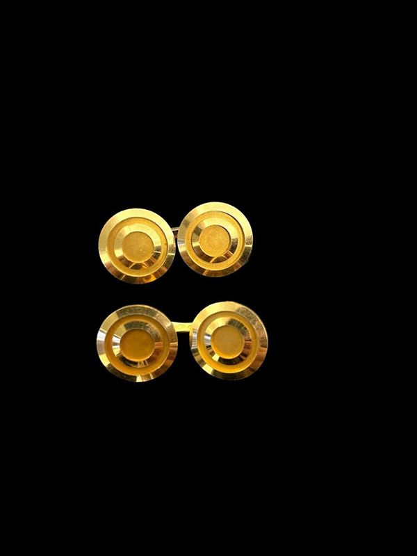 Gold cufflinks