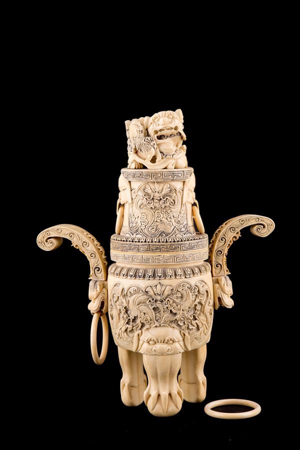 Vase with ivory lid