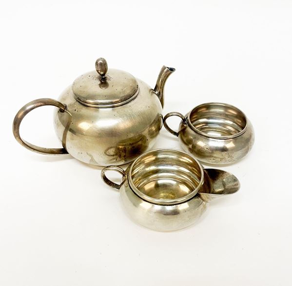 Silver teapot, milk jug and sugar bowl