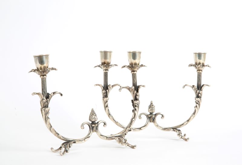 Due candelabri in argento