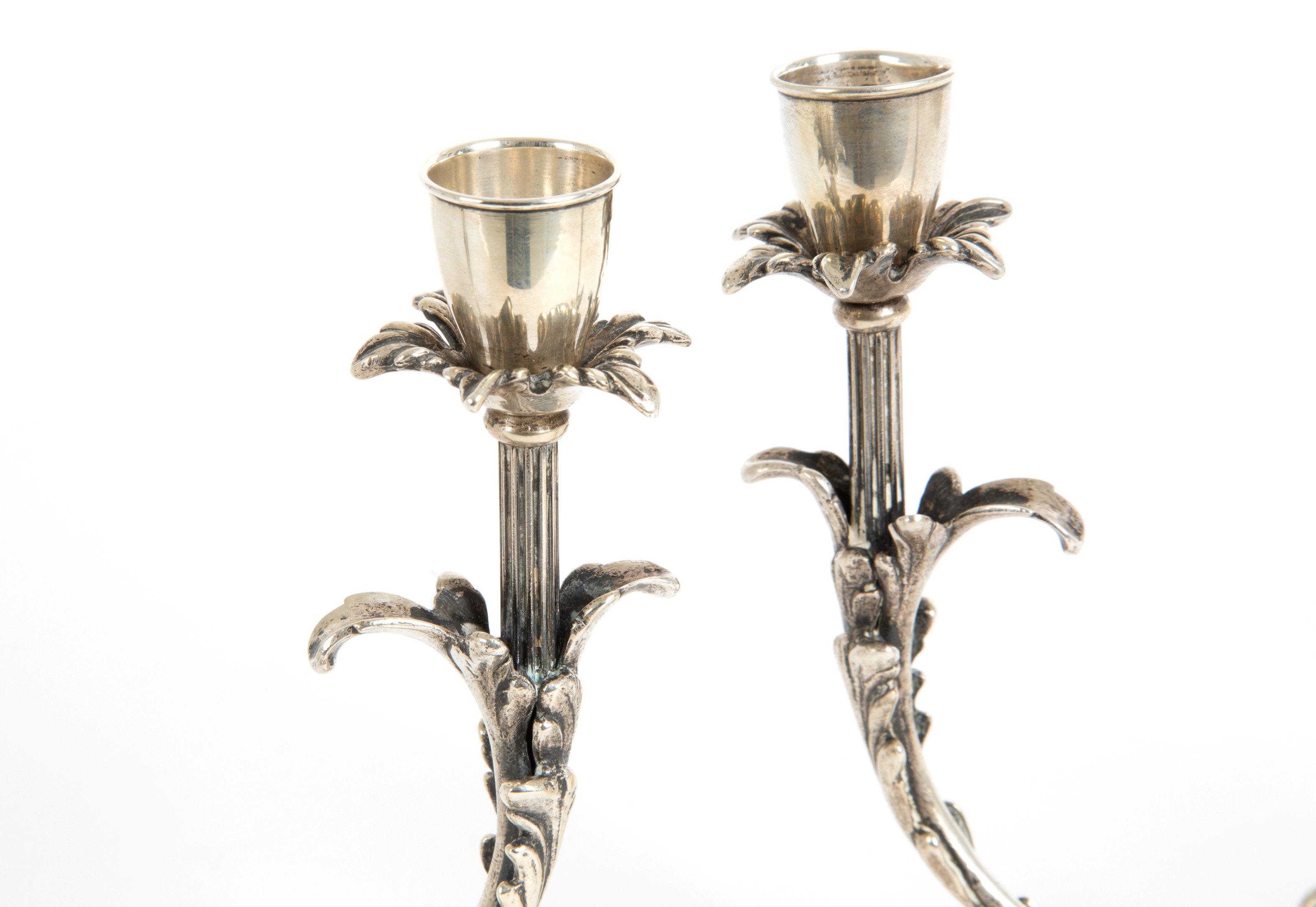 Due candelabri in argento