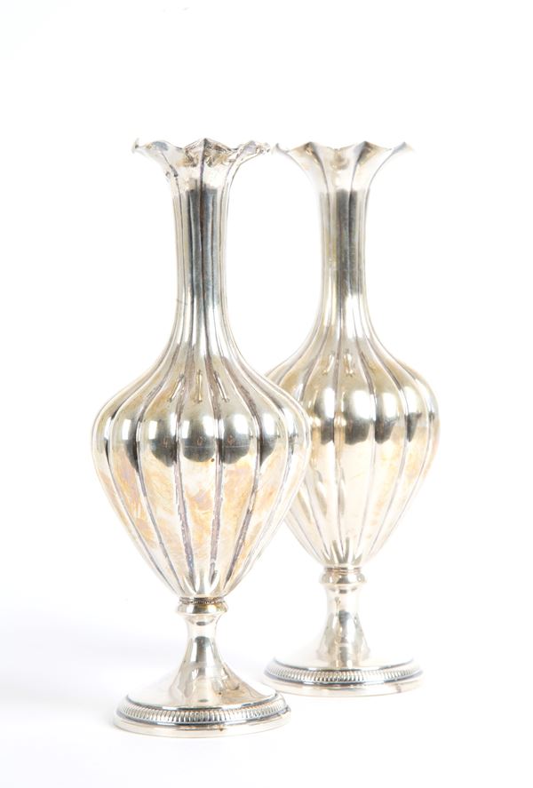 Two silver flower vases