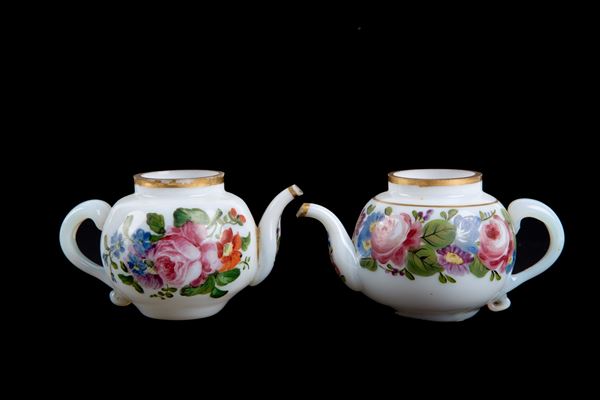 Pair of small glass teapots