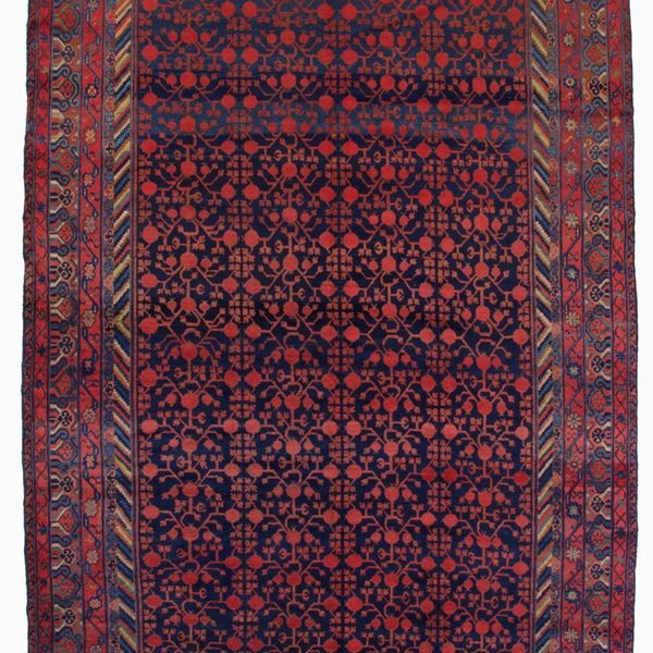 Tappeto Khotan disegno a melograni. Turkestan Orientale
