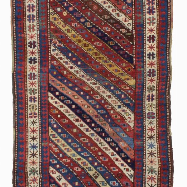 Ghendjè rug with diagonal band design. Caucasus