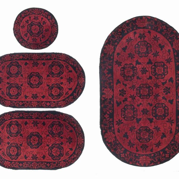 Four Pekino carpets. China